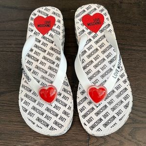Brand new MOSCHINO heart flip flops